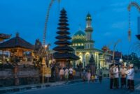 Malam Takbiran Idul Fitri 1447 Hijriah bertepatan dengan Hari Suci Nyepi Tahun Caka 1948, yang jatuh pada Kamis, 19 Maret 2026. [Ilustrasi AI]