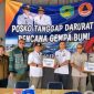 Penyerahan secara simbolis di Posko BPBD Manggarai Barat dan diterima oleh Wakil Bupati Yulianus Weng.